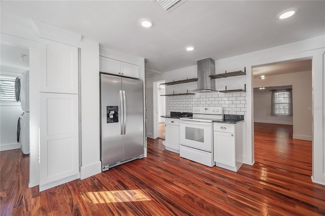 kitchen featuring white cabinets, dark hardwood / wood-style floors, white range with electric stovetop, and stainless steel refrigerator with ice dispenser