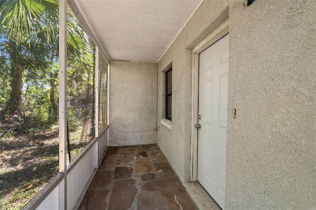 view of unfurnished sunroom