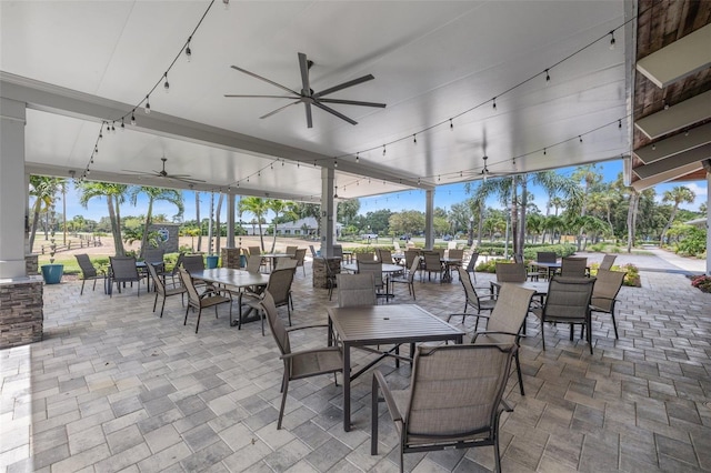 view of patio featuring ceiling fan