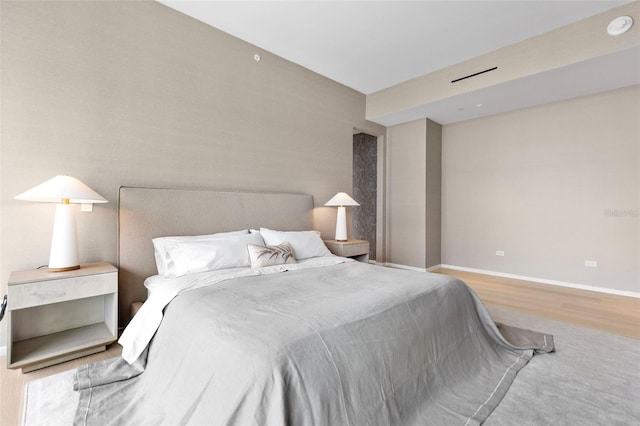 bedroom featuring hardwood / wood-style floors