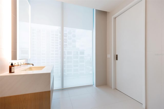 bathroom featuring vanity and tile patterned flooring