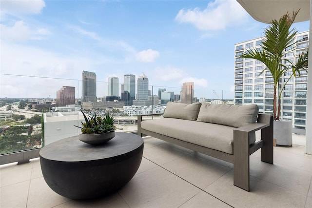 view of patio featuring a balcony