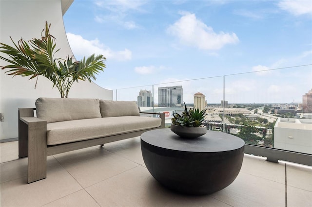 view of patio featuring a balcony