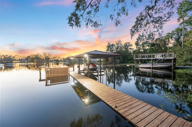 view of dock with a water view