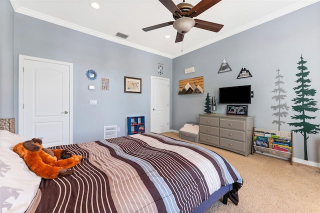 carpeted bedroom featuring ceiling fan and crown molding