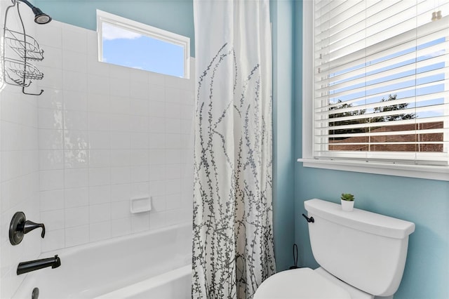 bathroom featuring toilet and shower / bathtub combination with curtain