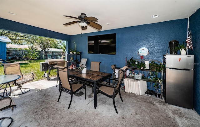 view of patio / terrace featuring ceiling fan