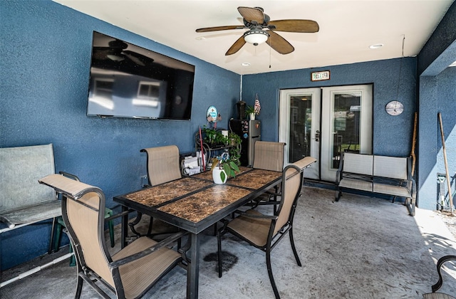 view of patio / terrace with french doors and ceiling fan