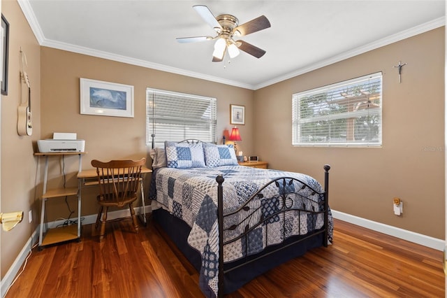 bedroom featuring ceiling fan, ornamental molding, multiple windows, and dark hardwood / wood-style flooring