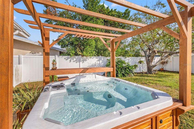 view of patio featuring a hot tub and a pergola