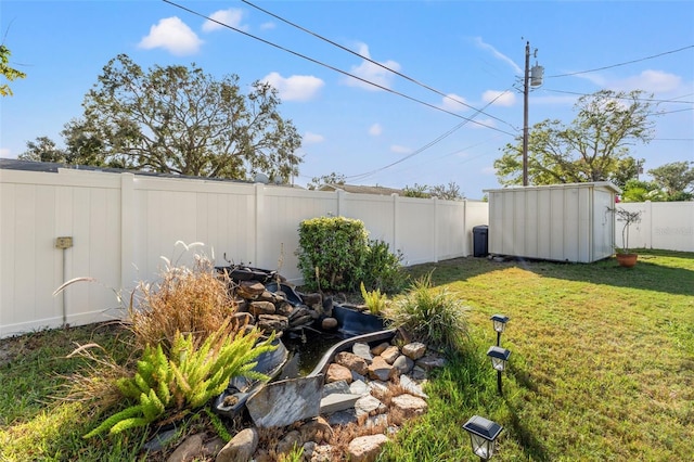 view of yard with a shed