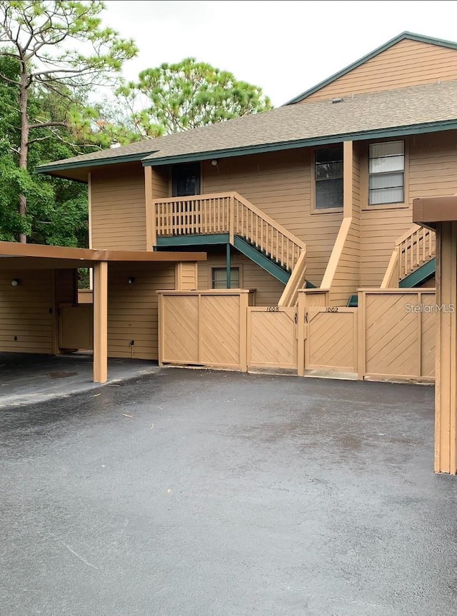 view of front of house featuring a carport