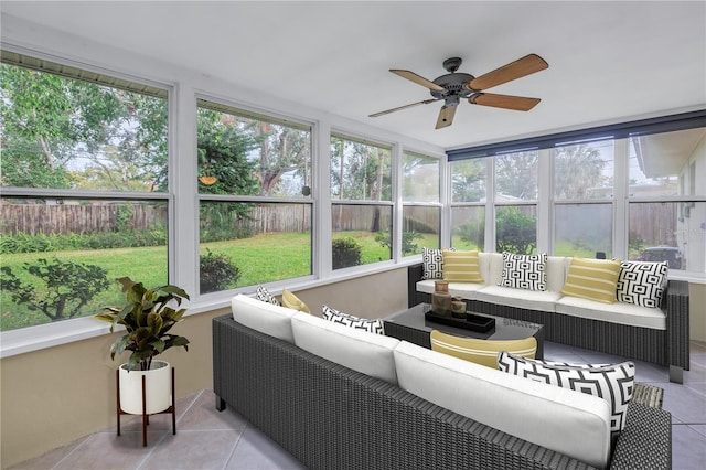 sunroom / solarium with ceiling fan