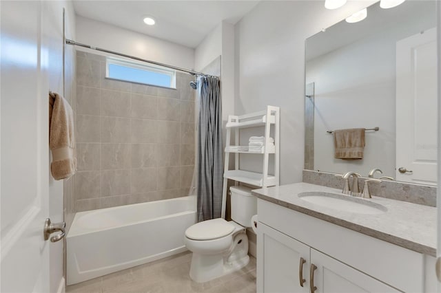 full bathroom with shower / tub combo, vanity, tile patterned flooring, and toilet