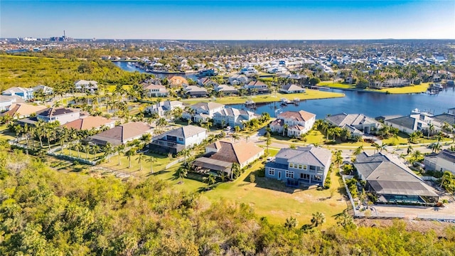 bird's eye view with a water view