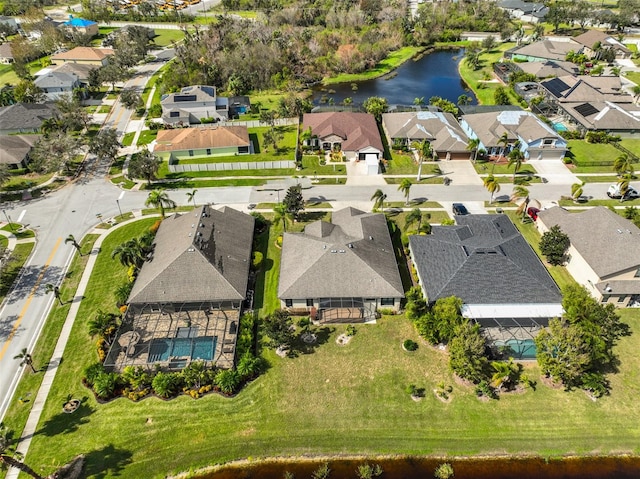 drone / aerial view featuring a water view