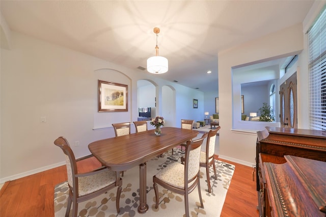 dining space featuring light hardwood / wood-style flooring