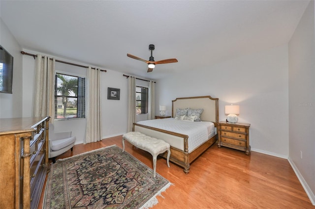 bedroom featuring light hardwood / wood-style flooring and ceiling fan