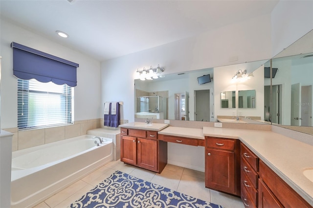 bathroom with vanity, tile patterned floors, and separate shower and tub