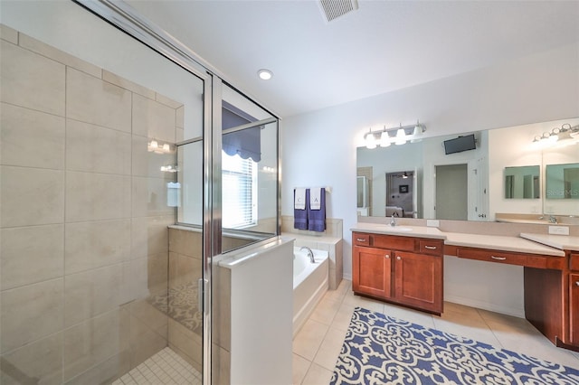 bathroom with vanity, plus walk in shower, and tile patterned floors