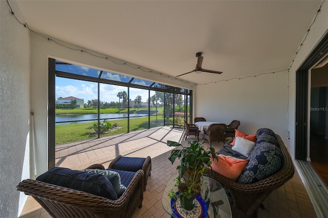 sunroom with a water view