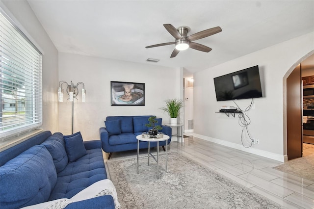 living room with ceiling fan