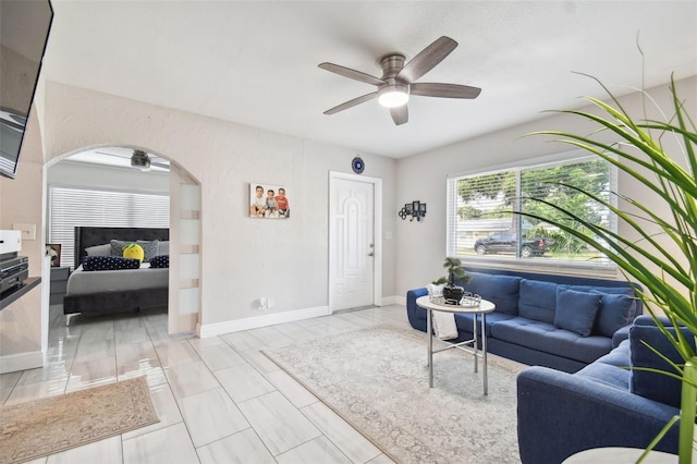 living room featuring ceiling fan