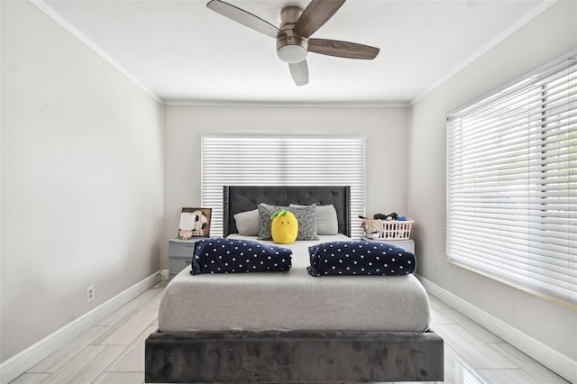 bedroom featuring ceiling fan and ornamental molding