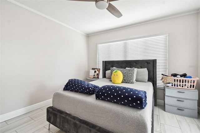 bedroom featuring ornamental molding and ceiling fan