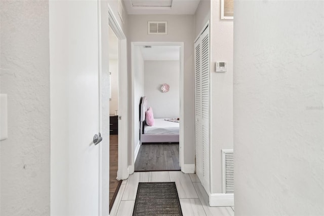 hallway featuring light hardwood / wood-style floors