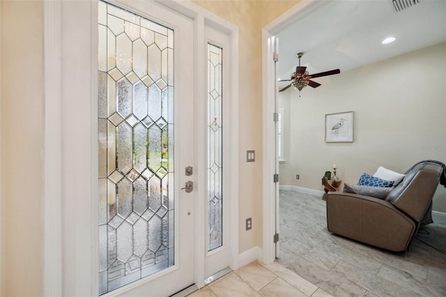 entryway with ceiling fan