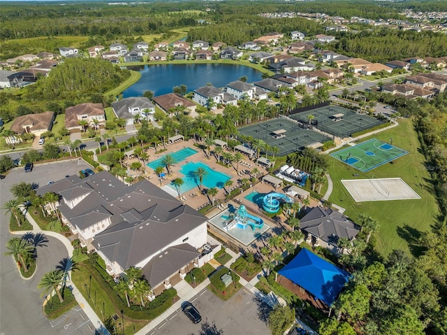 birds eye view of property with a water view