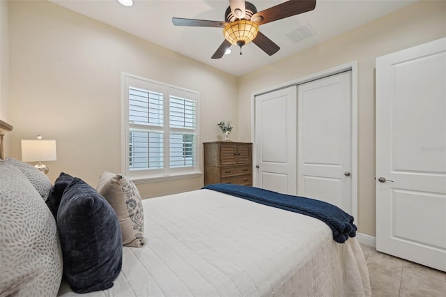 bedroom with a closet and ceiling fan