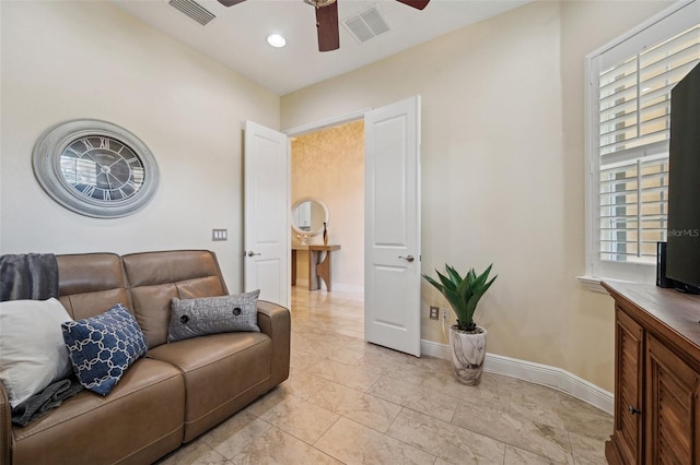 living room featuring ceiling fan