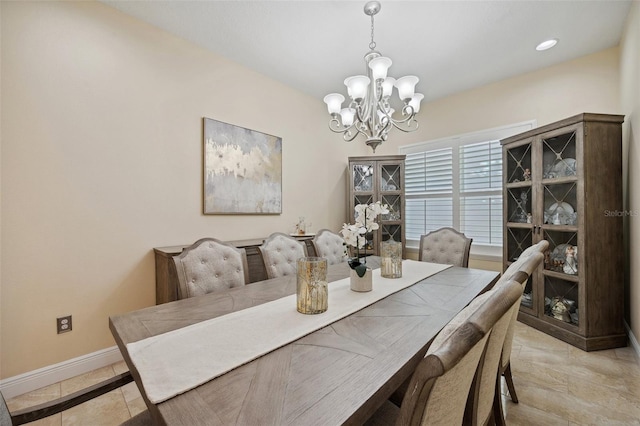 dining area with a chandelier