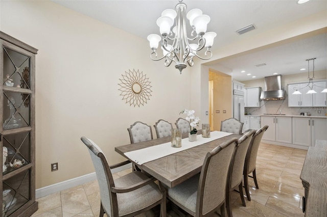 dining room featuring an inviting chandelier