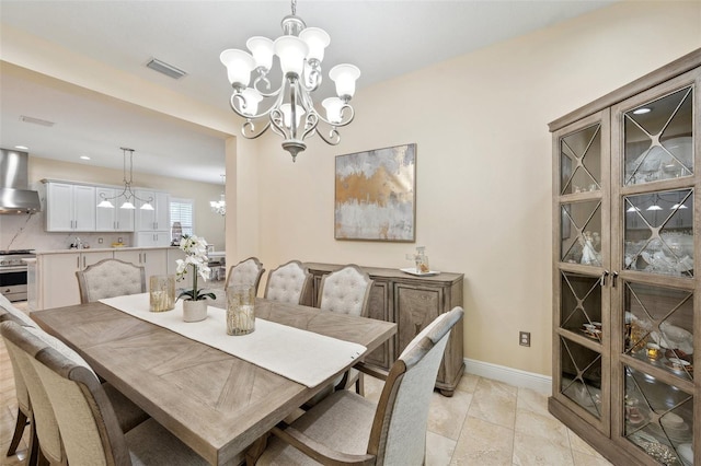 dining space with a chandelier