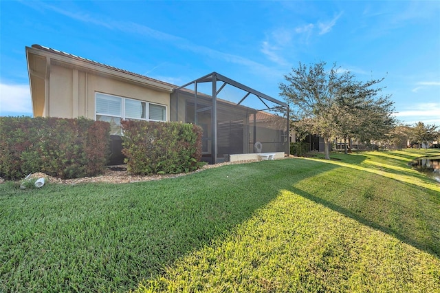 view of yard featuring a lanai