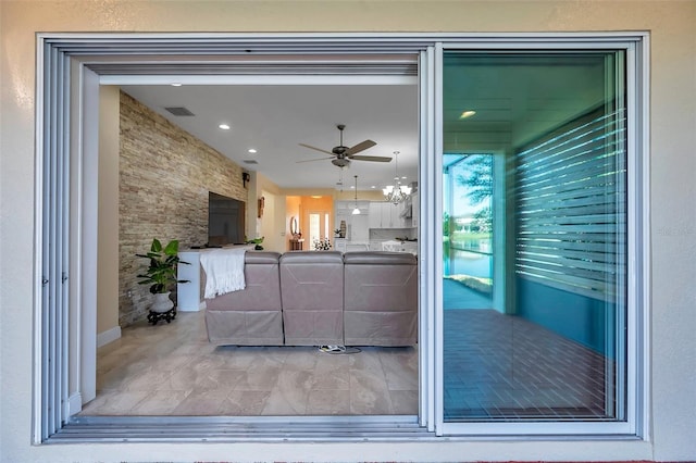 living room with ceiling fan