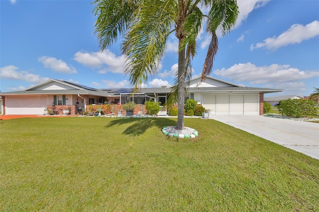 single story home with a garage and a front lawn