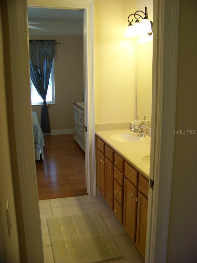 bathroom with vanity and tile patterned flooring