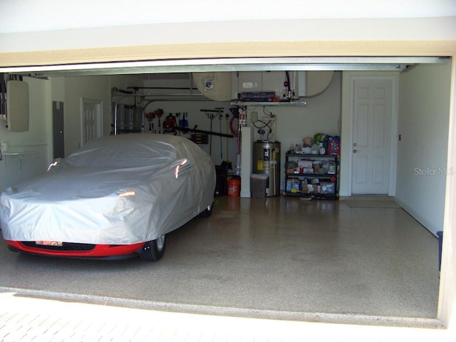 garage with electric panel and water heater