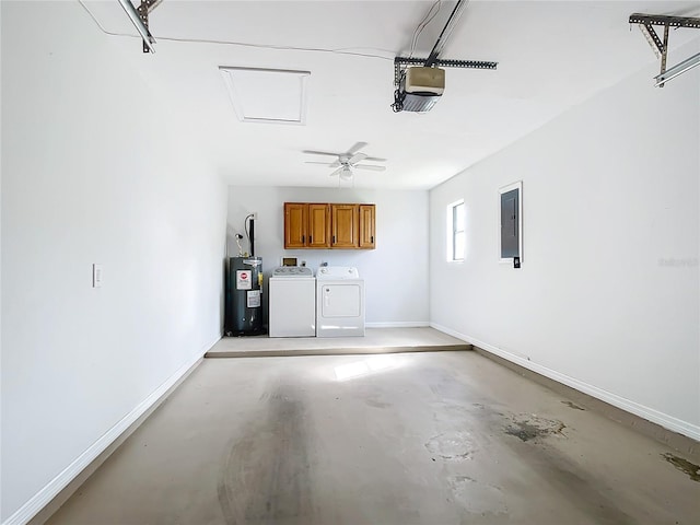 garage featuring electric water heater, ceiling fan, electric panel, and washer and clothes dryer