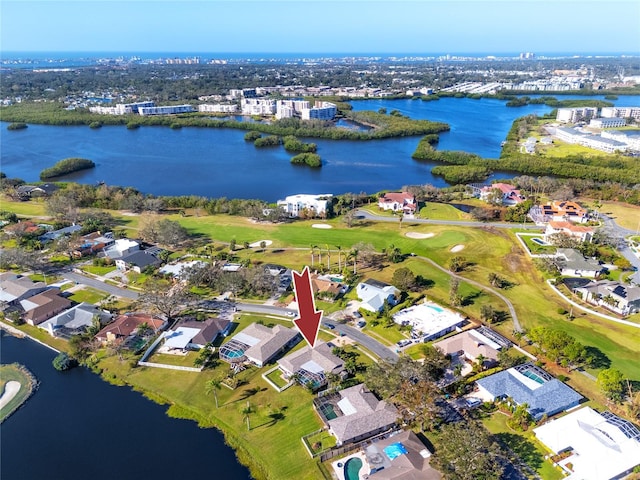 birds eye view of property with a water view