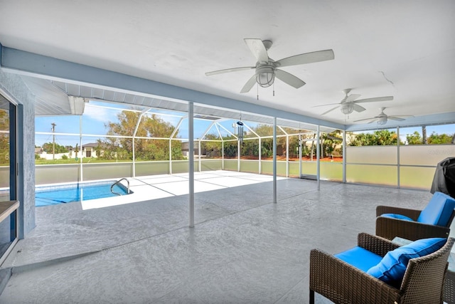 sunroom / solarium featuring a pool