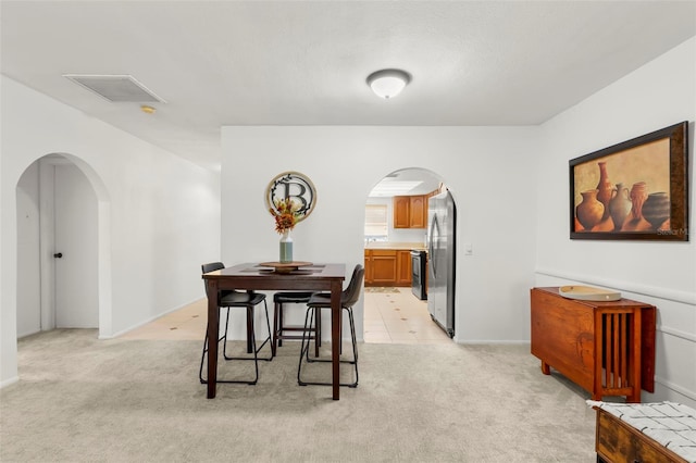 view of carpeted dining room