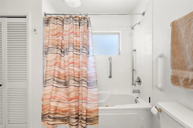 bathroom with toilet and shower / bathtub combination with curtain