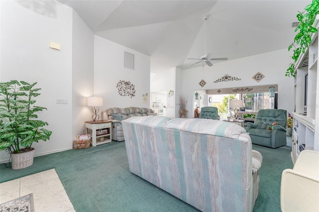 carpeted bedroom with ceiling fan and high vaulted ceiling