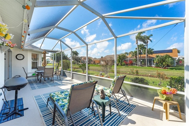 view of patio with a lanai