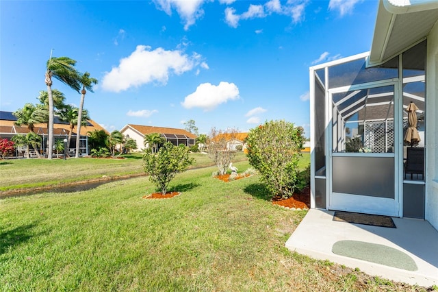 view of yard featuring a lanai